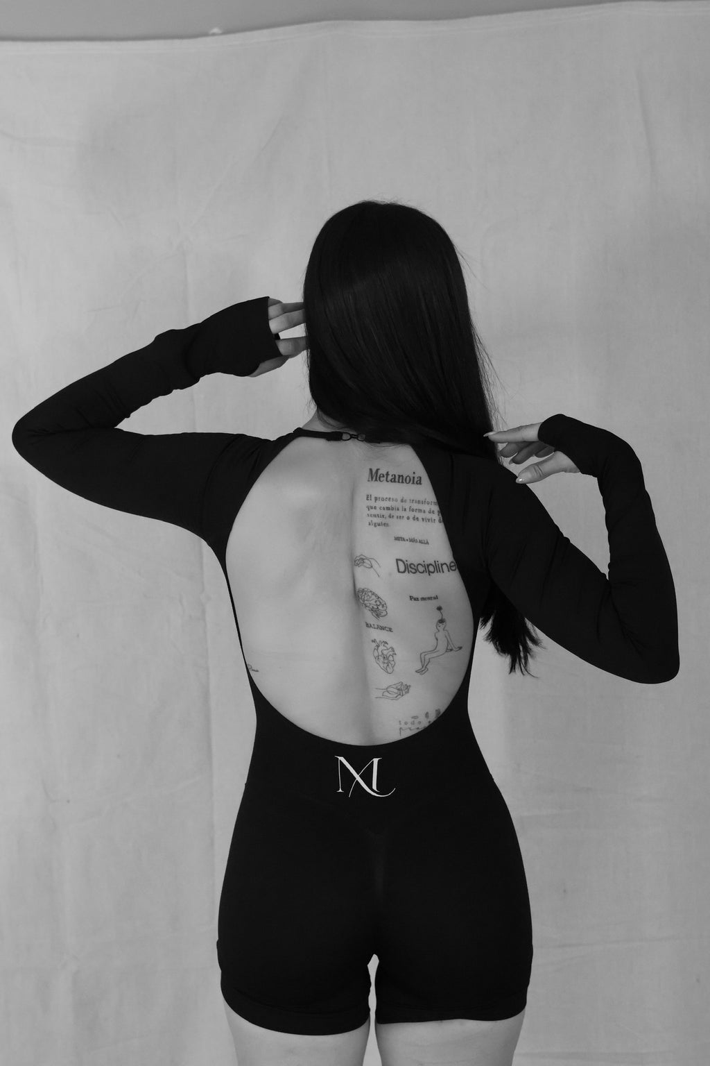 LIMITLESS OPEN BACK ROMPER